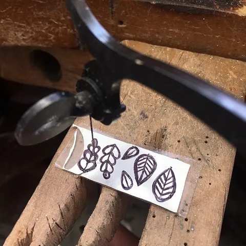 Here is a tip for when you are sawing designs out of sheet from @adornedsmithingco - “I like to use tape over my marker...