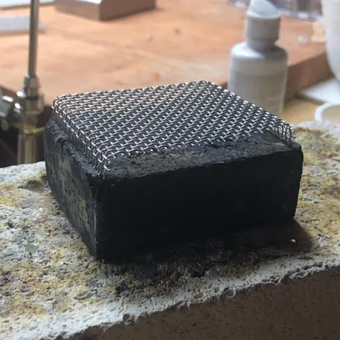 I love this soldering surface that elevates your work from @lierreworks - “This modified mesh makes a great replacement...