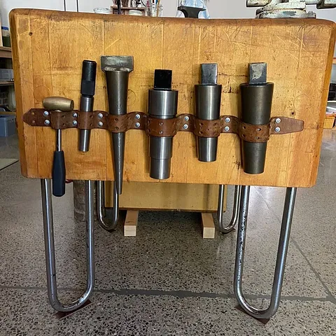 Here is a tool organization tip from @blueberryjewelry02 - “Old leather belt repurposed to a tool hanger. Use for...
