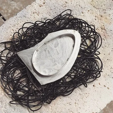 Jeweler @mothersonthemountainjewelry brought this #solderingnest idea from @ganoksin_project to life with 22g steel...