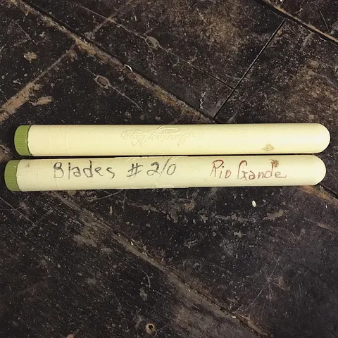 I store my saw blades in cigar tubes. You could even take it a step further and color code the tubes to quickly identify...