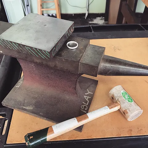 If you need to get a ring flat - place it between two steel blocks and give it a nice whack with your raw hide hammer....