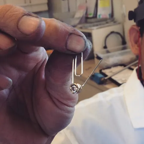 If you are polishing a pendant at a buffing machine use this amazing tip from @shmick_shmack - “Sling a paper clip through...