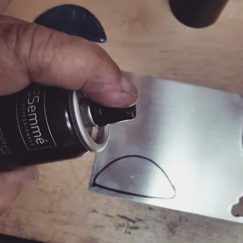 This method for applying an image directly to sheet metal is ingenious! You spray hairspray directly onto your metal and...