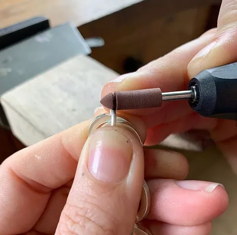 Here is a awesome mandrel modification from @lucywalkerjewellery - “Using a modified rubber wheel to clean up a 16 gauge...