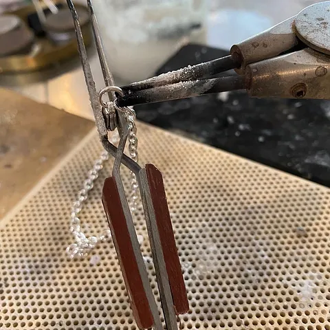 Here is a soldering tip from @blueberryjewelry02 - “When soldering a clasp and jump ring to the end of a chain, use an...