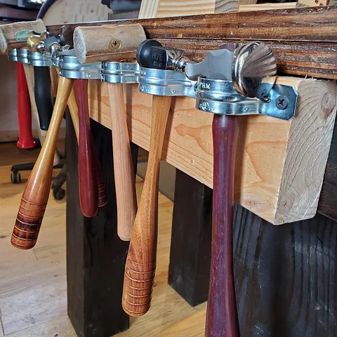 Here is a tip for storing hammers from @magpiperjewelry - “I screwed 1" and 1.5" two hole metal straps from the hardware...