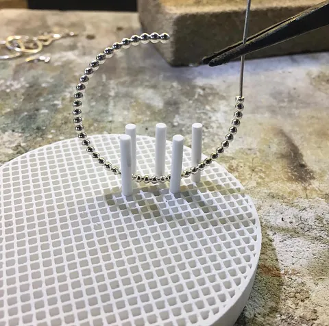 Here is a tip for soldering on earring posts from @twistedsistersjewelry -“This ceramic pad and pegs help hold things that...