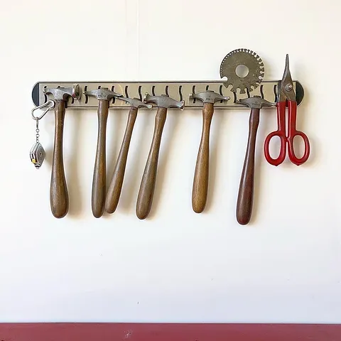 Here is a storage tip from @ringgoldnicole - “ I use magnetic 🧲 knife strips to hold my tools which helps keep my work...