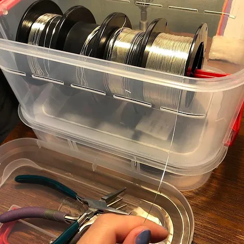 Here is a storage tip for wire from @harmonizejewelry - “I found this Christmas ribbon organizer box at Target for a few...