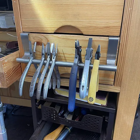 Here is a fantastic plier storage solution from @marquisjewelryacademy - “I use this 9" towel bar that perfectly fits the...