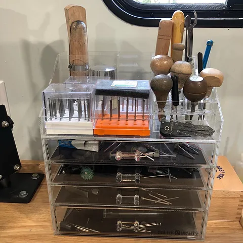 Here is a tool storage tip from @milestonejewelryllc - “You can find clear cosmetic organizers like this on Amazon.com in...