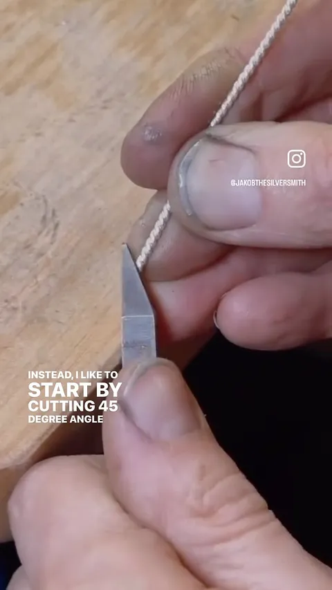 A helpful tip for adding twisted wire borders around a bezel from @jakobthesilversmith - “Start with a 45 degree cut so...